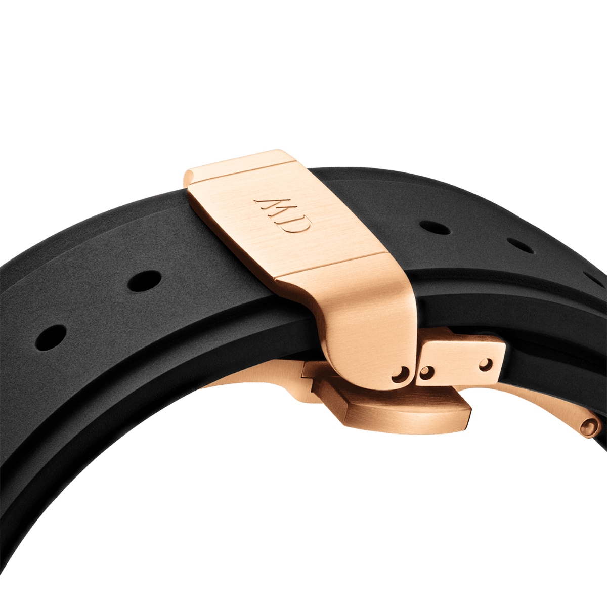 Close-up of the Switch Rose Gold Apple Watch case’s deployment clasp in brushed rose gold stainless steel, attached to a black FKM rubber strap for a secure and comfortable fit.