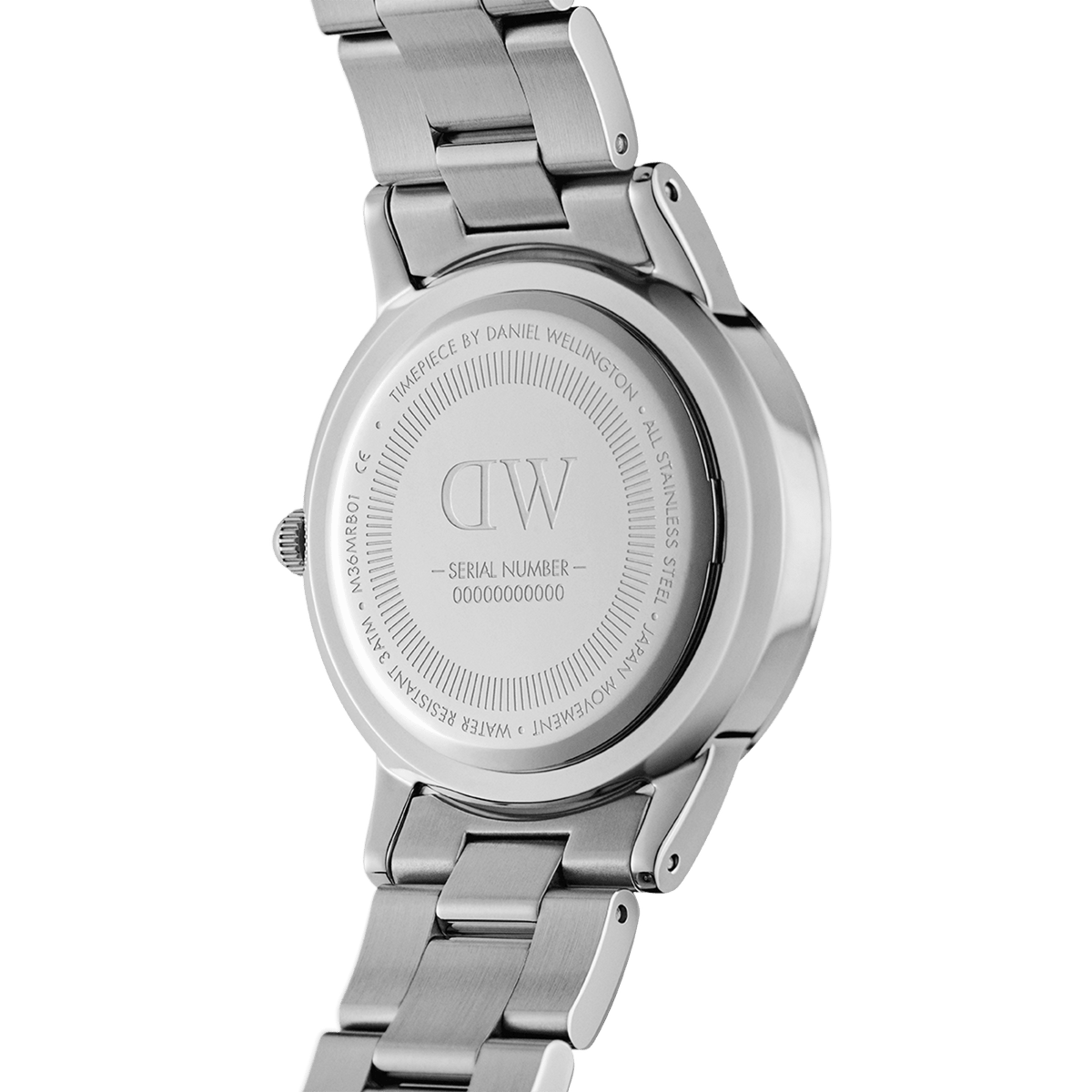 The back of the Iconic Link watch shows its polished stainless steel case and bracelet, featuring engraved branding, water resistance details, and a unique serial number for authenticity.