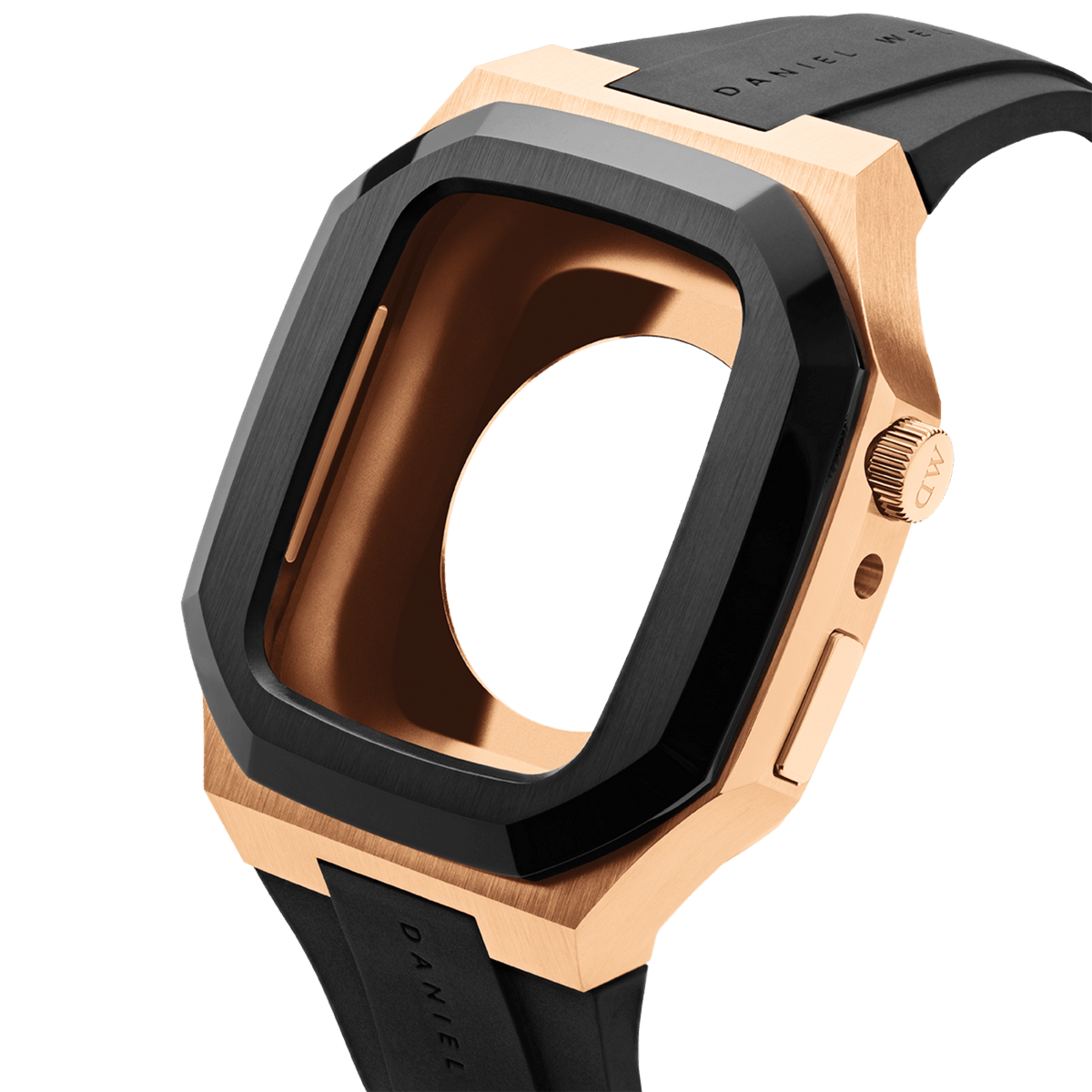 Switch Rose Gold Apple Watch case featuring brushed rose gold stainless steel, a bold black bezel, and an integrated black FKM rubber strap, shown from an angled perspective to highlight its geometric design and premium finish.