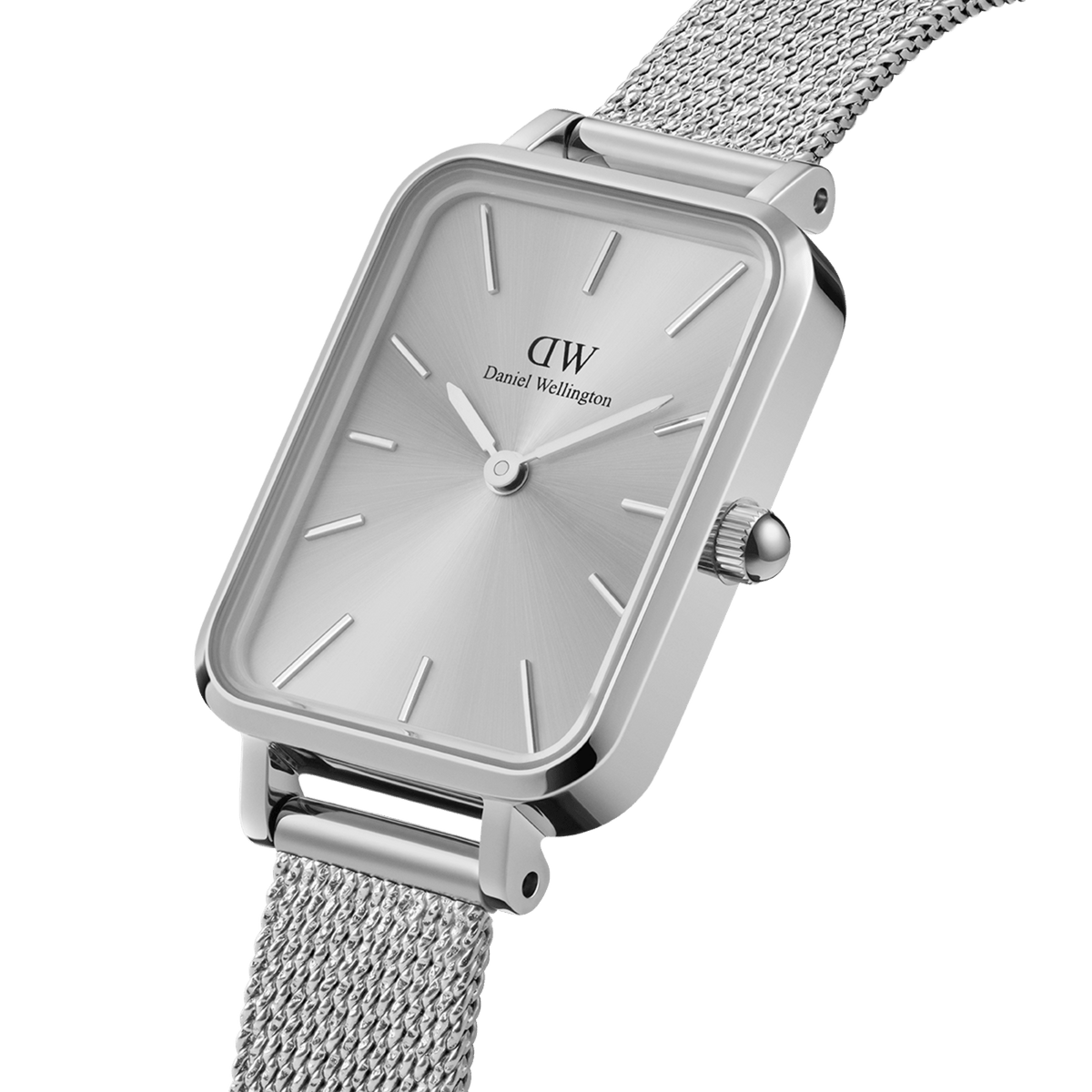 Quadro Pressed Unitone Silver ladies watch with a rectangular brushed silver dial, minimalist hour markers, and a seamless silver mesh strap, shown in a close-up highlighting its refined stainless steel finish.