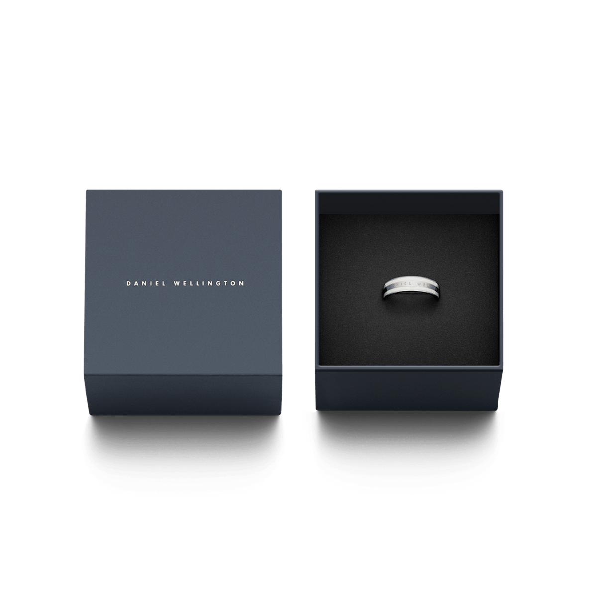 Emalie Ring Silver presented in an elegant Daniel Wellington gift box, featuring a minimalist silver band with a satin white enamel accent and engraved branding, ideal for gifting or special occasions.
