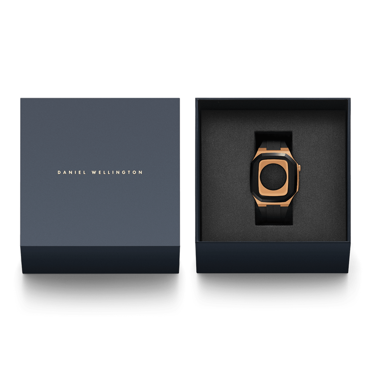 Switch Rose Gold Apple Watch case presented in a premium Daniel Wellington gift box, featuring brushed rose gold stainless steel, a bold black bezel, and a black FKM rubber strap.