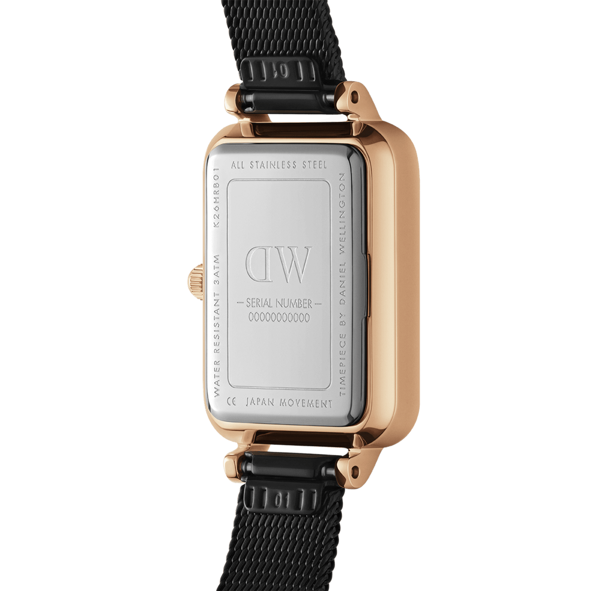 Back view of the Quadro Pressed Ashfield B 29x36,5 Rose Gold watch showing the stainless steel case, engraved details, and adjustable black mesh strap.