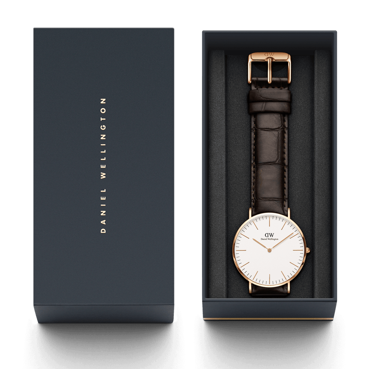 Classic York Rose Gold watch presented in a branded Daniel Wellington gift box, featuring a dark brown croc-embossed genuine leather strap and minimalist white dial with rose gold accents.
