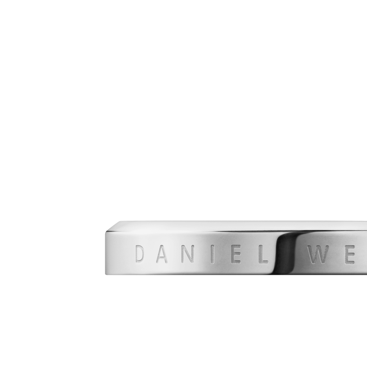 Close-up of the Classic Ring in silver stainless steel, showing the engraved Daniel Wellington branding and smooth, polished finish.