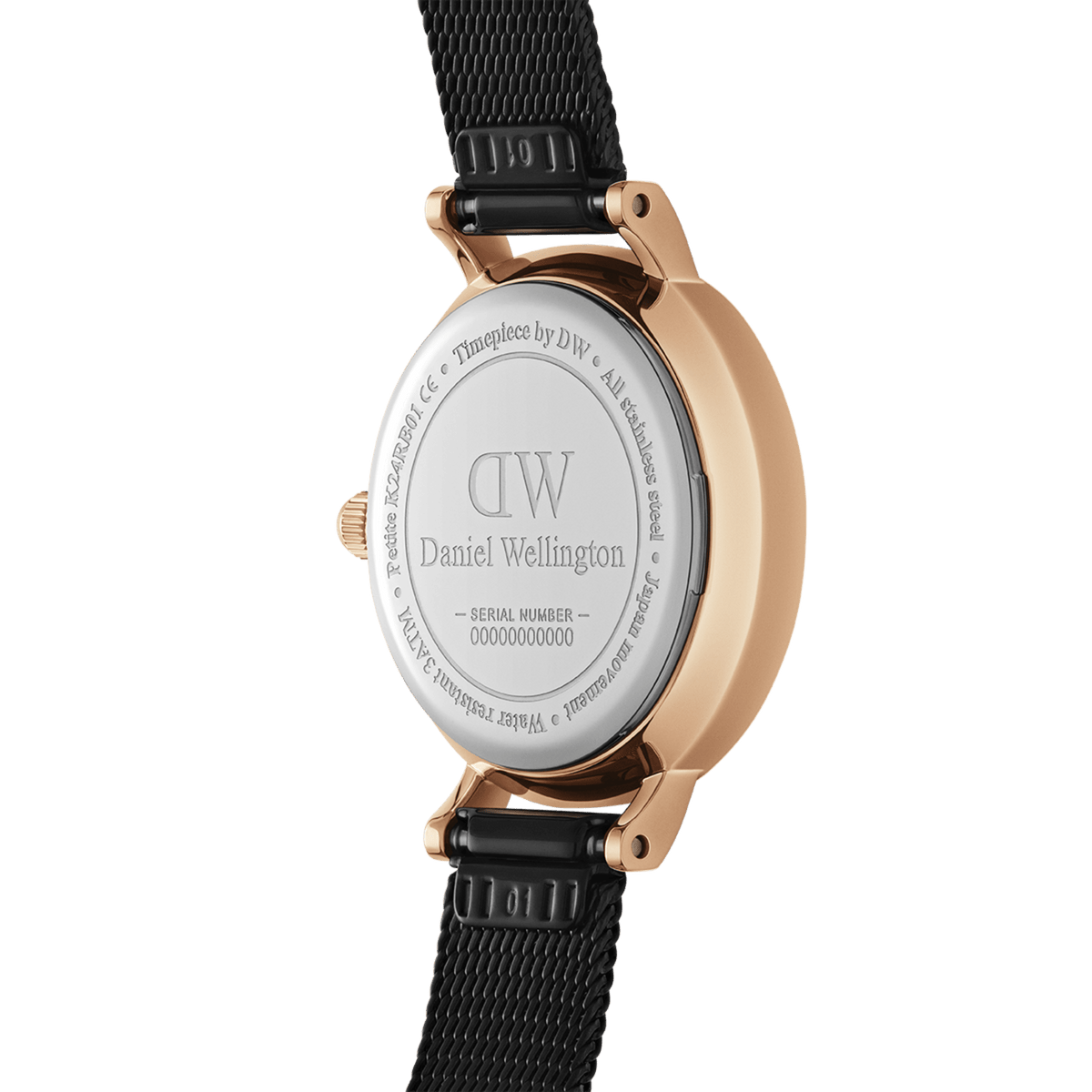 Close-up of the Petite Pressed Ashfield watch showing the engraved stainless steel case back, rose gold plating, and adjustable black mesh strap.