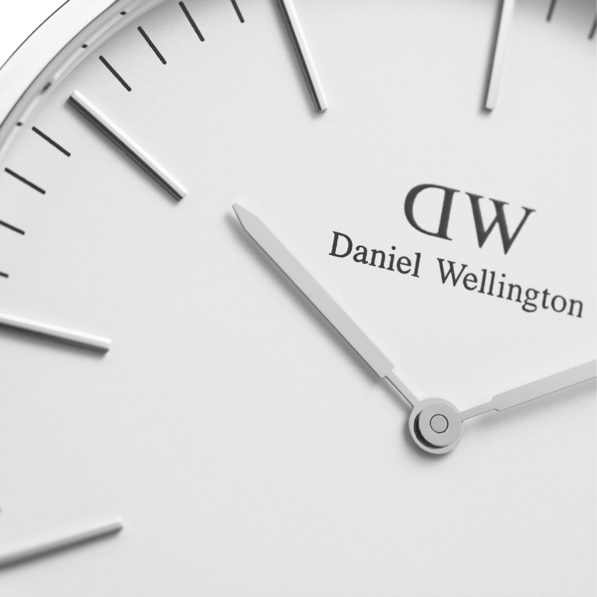 Detailed view of the Classic St Mawes Silver watch dial, showing the minimalist eggshell white face, slim silver hands, and refined hour markers for a timeless and elegant look.