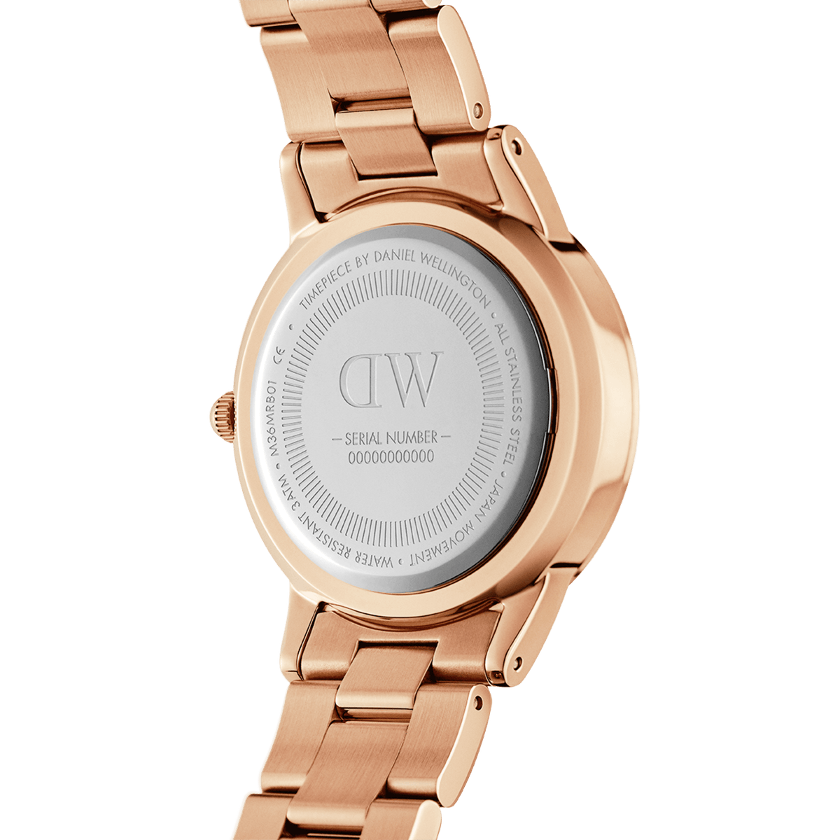 Back view of the Daniel Wellington Iconic Link Black Rose Gold watch showing the engraved stainless steel case back, rose gold bracelet, and serial number detailing.