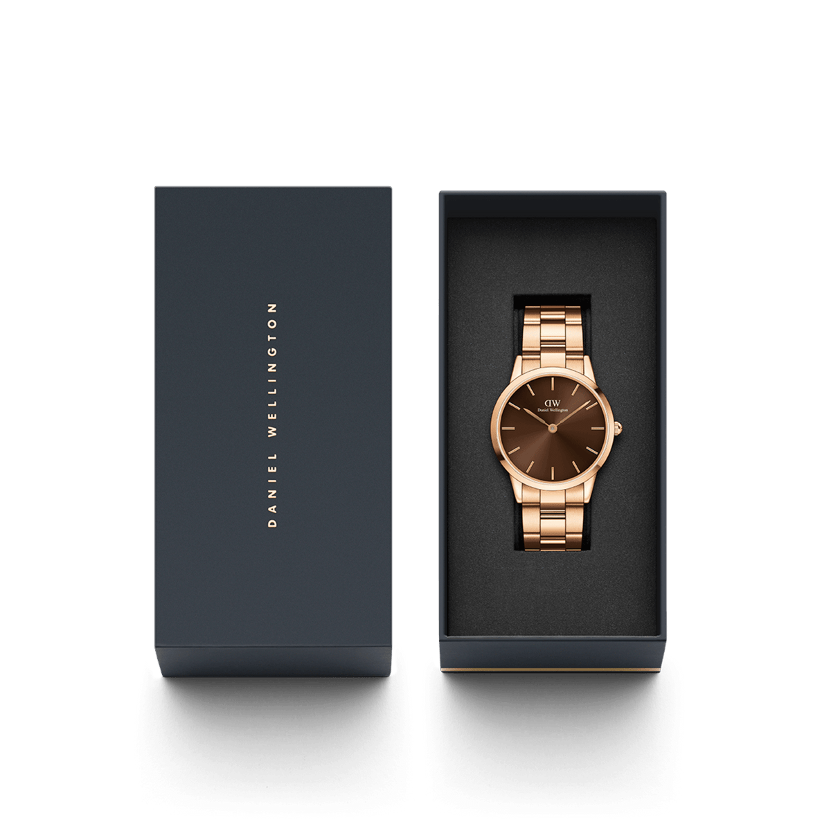 Daniel Wellington Iconic Link Amber watch with a rose gold bracelet and sunray brown dial, presented in a sleek branded gift box.