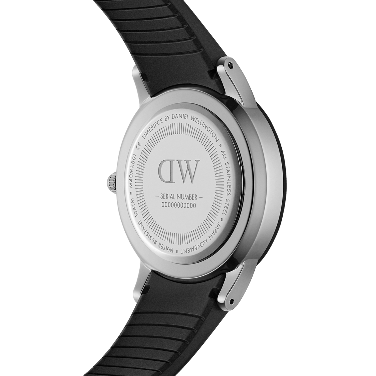 Close-up of the Daniel Wellington Iconic Motion Silver watch case back, showing the engraved branding, stainless steel construction, and black FKM rubber strap.