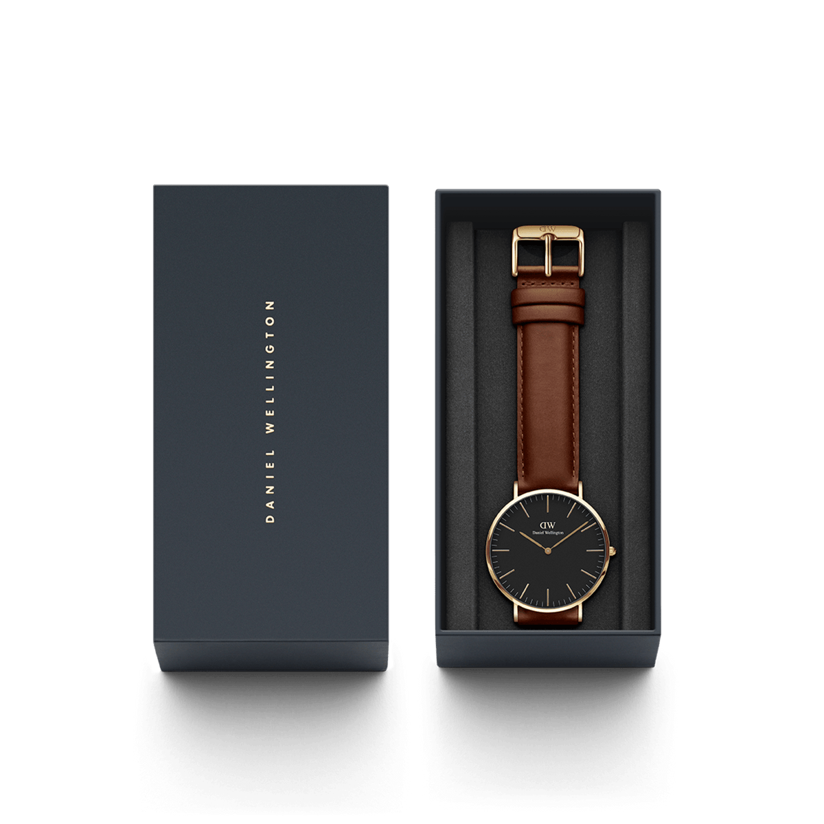 Classic St Mawes Gold watch with a black dial, gold case, and brown leather strap, presented in a branded Daniel Wellington gift box.