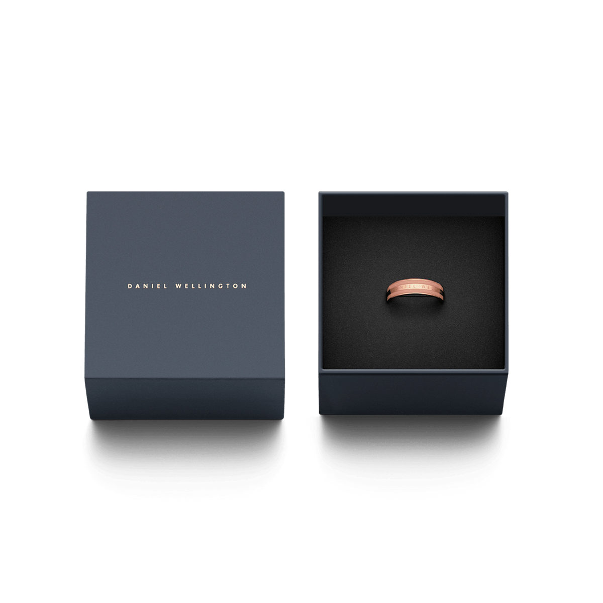 Emalie Ring Dusty Rose Rose Gold displayed in an elegant dark Daniel Wellington gift box, highlighting the rose gold band with dusty rose enamel detailing.