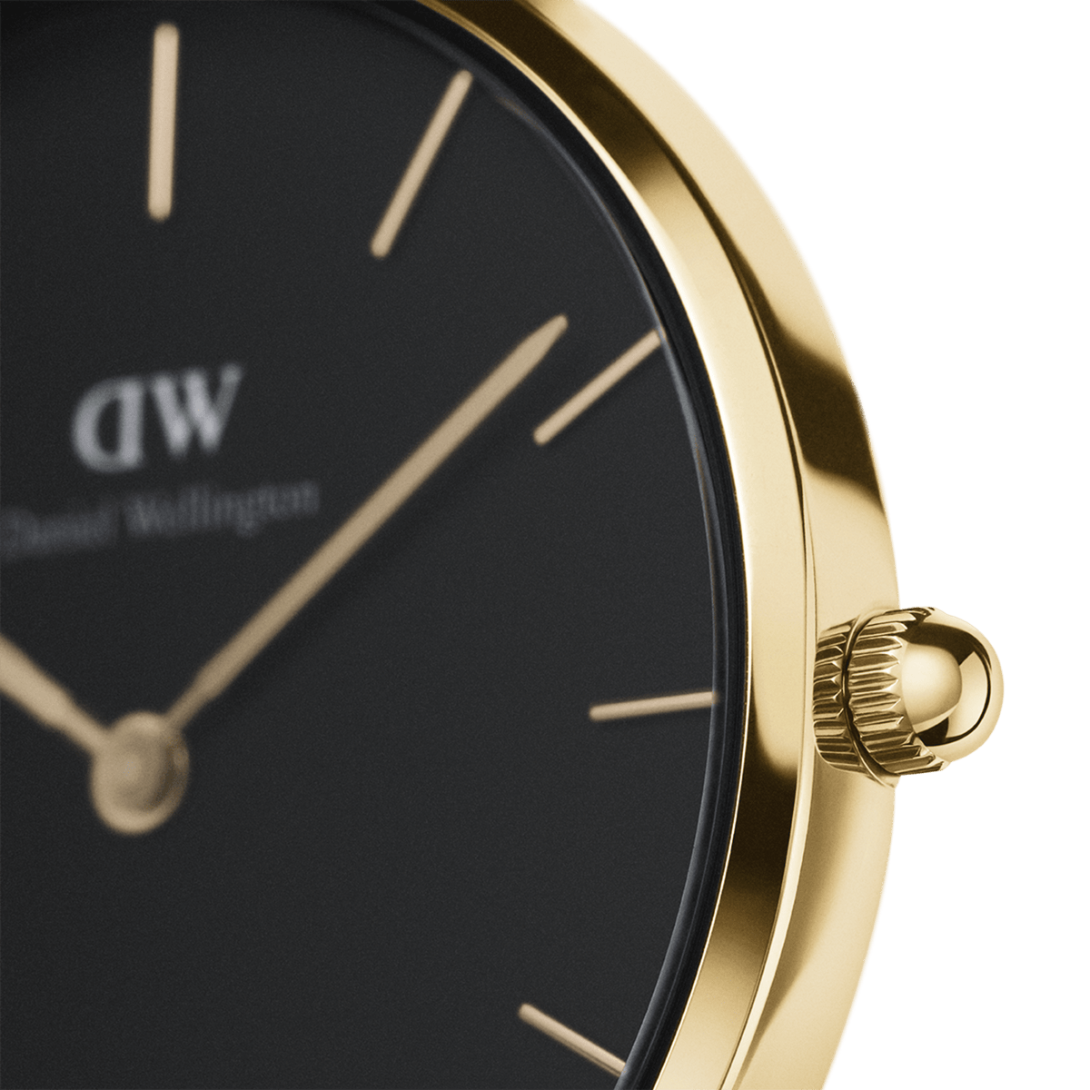 Close-up of the Petite Sheffield Black Gold watch showing the polished gold stainless steel case, minimalist black dial with slim gold markers, and detailed crown design.