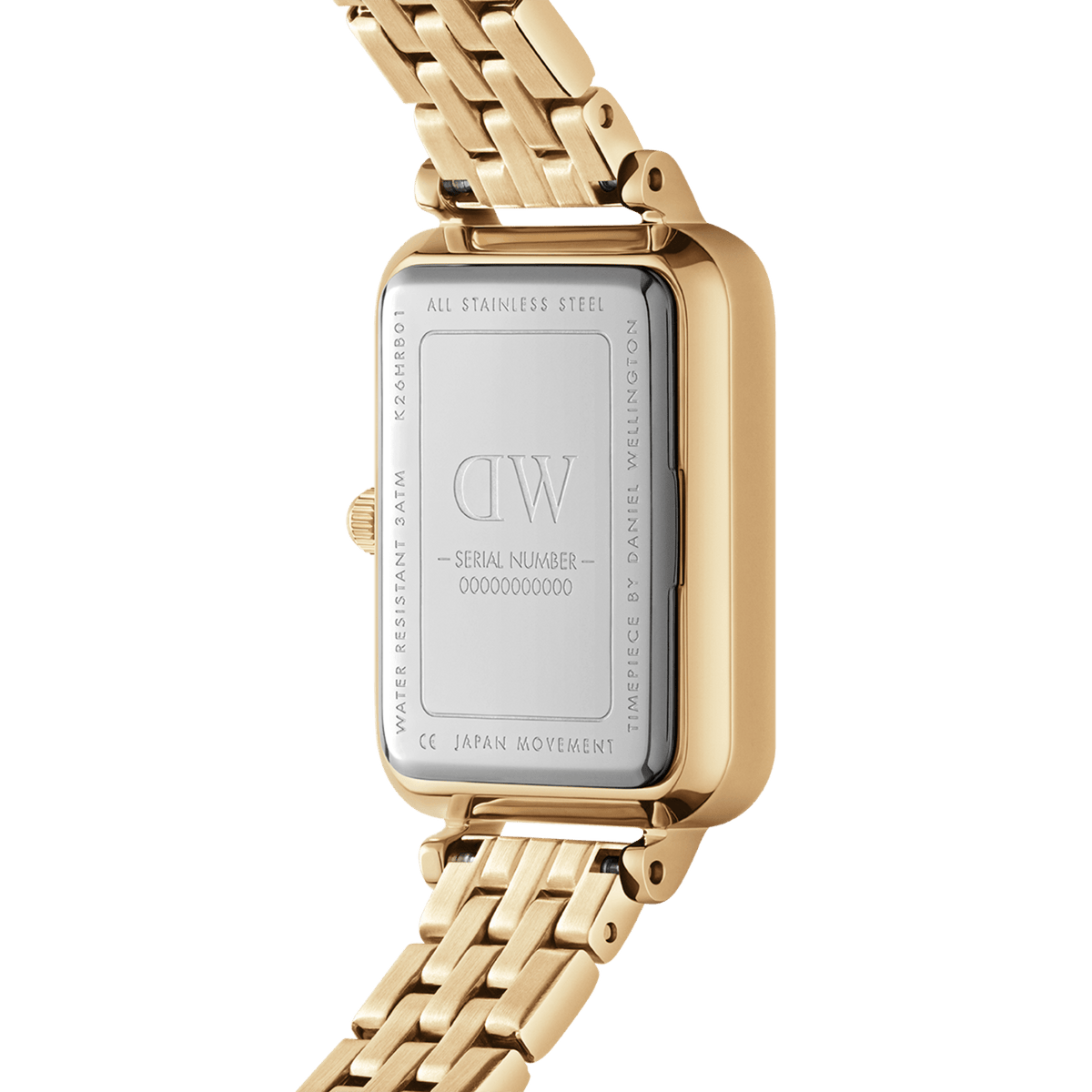 Close-up of the Quadro 5-Link Evergold watch showing the stainless steel case back, gold 5-link bracelet, and engraved details including water resistance and Japanese movement.