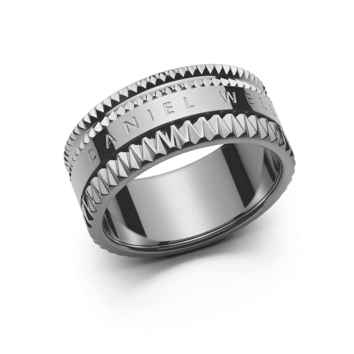 Wide silver ring with geometric textured edges and a polished centre engraved with the Daniel Wellington logo, showcasing a modern, architectural design.