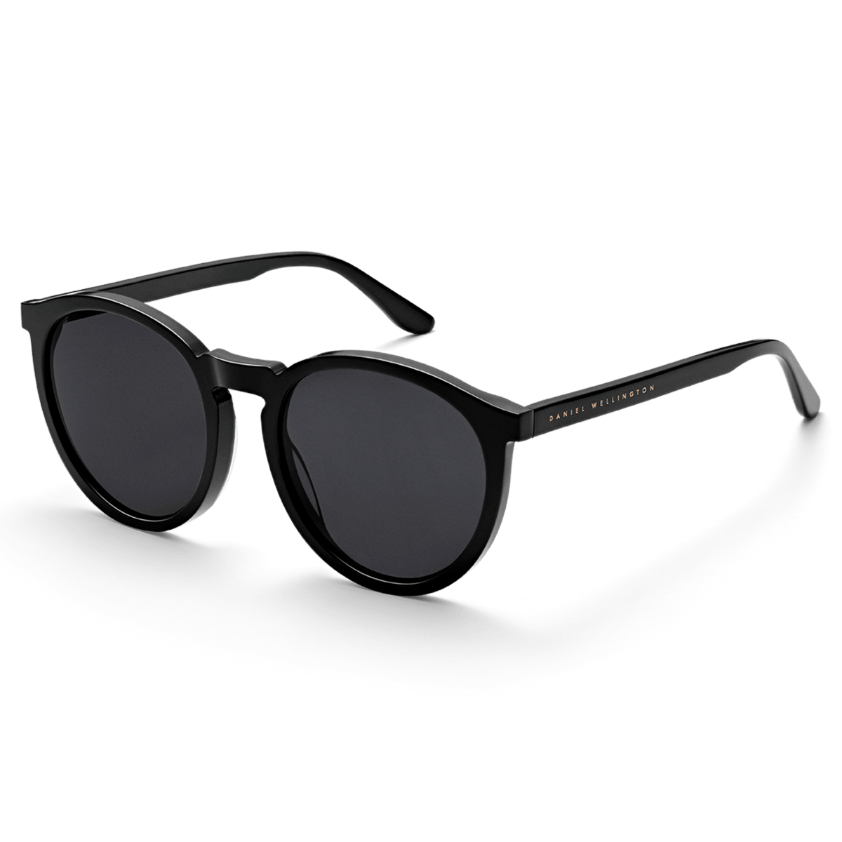 Arch Bio-Acetate Black sunglasses featuring a sleek round black frame, deep black lenses, and Daniel Wellington branding on the temple, designed for comfort and everyday UV protection.