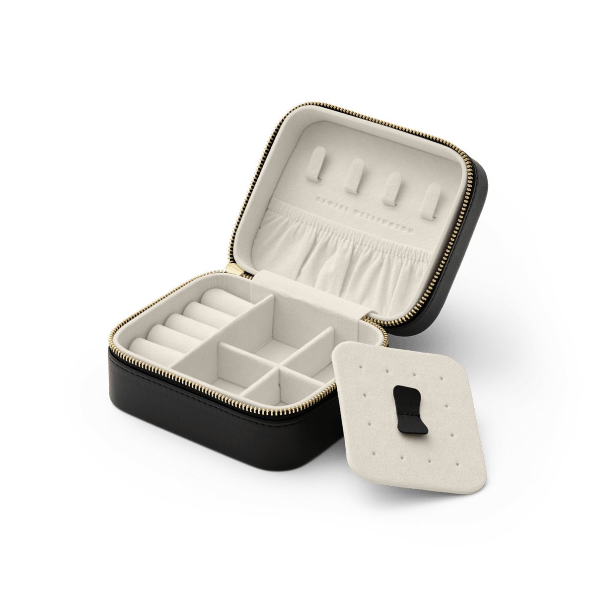 Travel Jewellery Box Black by Daniel Wellington with a gold zip, open to reveal multiple compartments, a pouch pocket, ring holders, and a removable divider for organised storage of accessories.