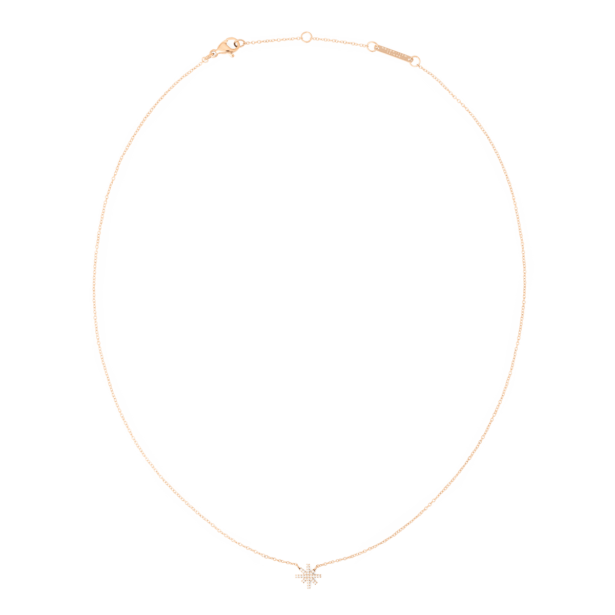 Delicate rose gold necklace featuring a fine chain and a small star-shaped pendant set with sparkling white cubic zirconia stones, designed to sit elegantly on the collarbone.