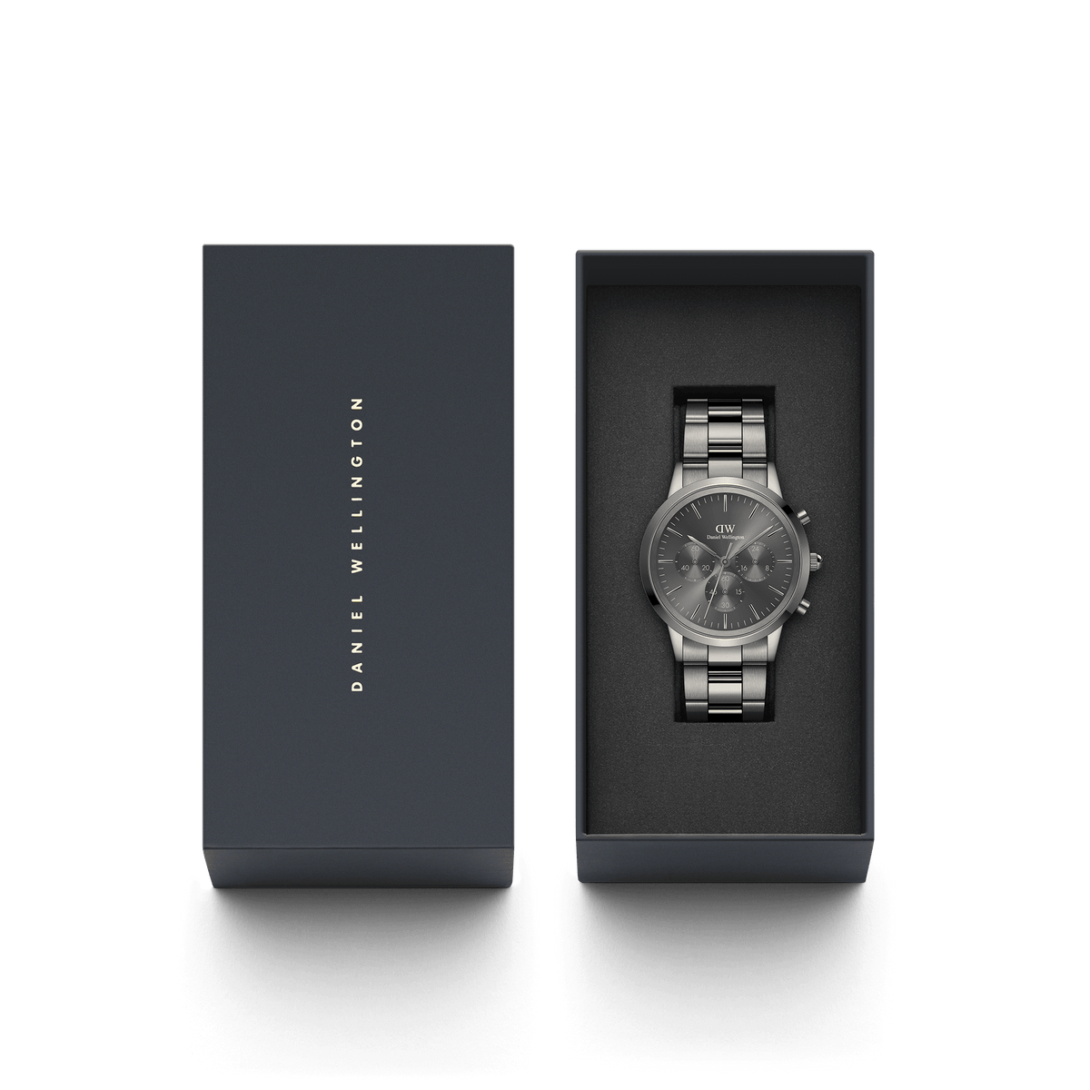 Iconic Chronograph Link Graphite men's watch presented in a Daniel Wellington gift box, featuring a graphite stainless steel bracelet and sleek grey dial, ideal for gifting on special occasions.