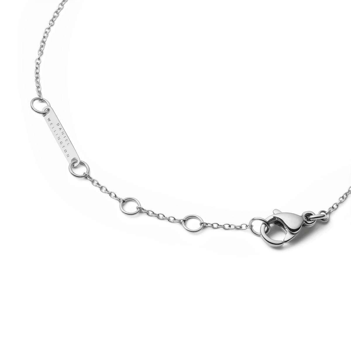 Detail of the Audrey Bracelet Tiger Eye Silver showing the adjustable silver chain with multiple sizing rings, a secure lobster clasp, and a branded tag for a comfortable, personalised fit.