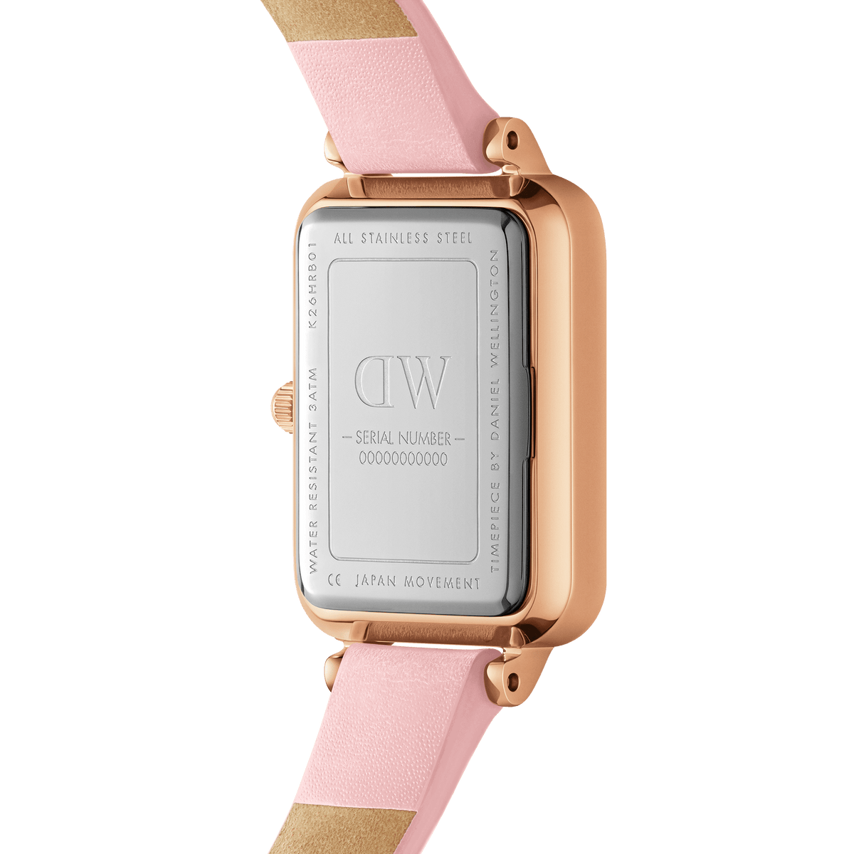 Rear view of the Quadro Cherry Blossom watch showing the engraved stainless steel case back, rose gold frame, and pastel pink leather strap, highlighting water resistance and Japanese movement details.
