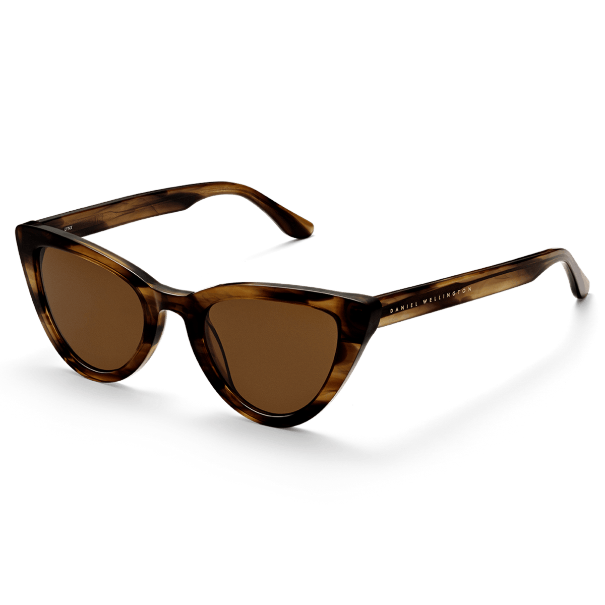 Lynx Bio-Acetate Brown Demi sunglasses with a cat eye silhouette, featuring a brown demi frame, amber lenses, and Daniel Wellington branding on the arm.