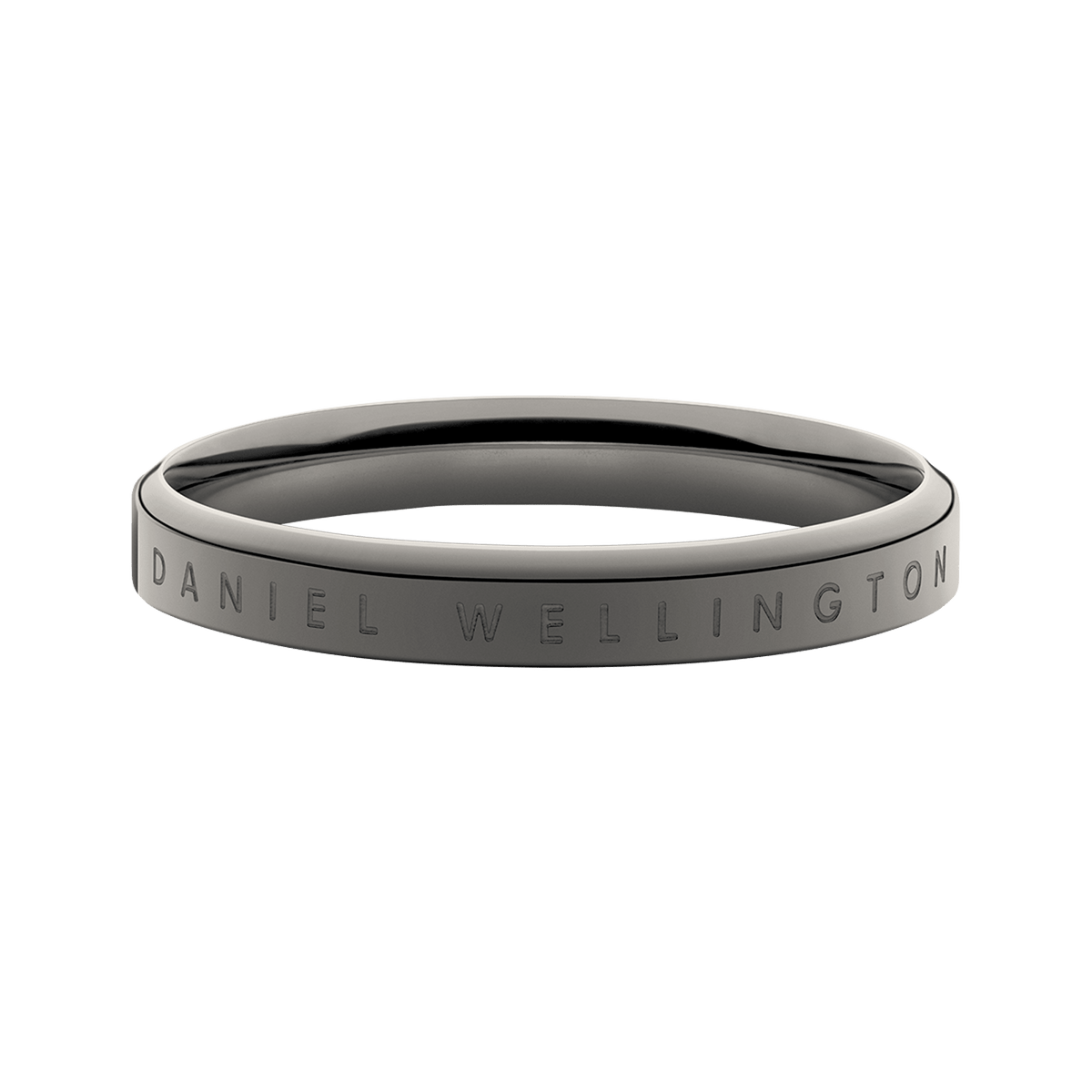 Classic Ring Graphite featuring a minimalist graphite-toned stainless steel band with engraved Daniel Wellington branding, shown in a close-up to highlight its smooth finish and modern silhouette.
