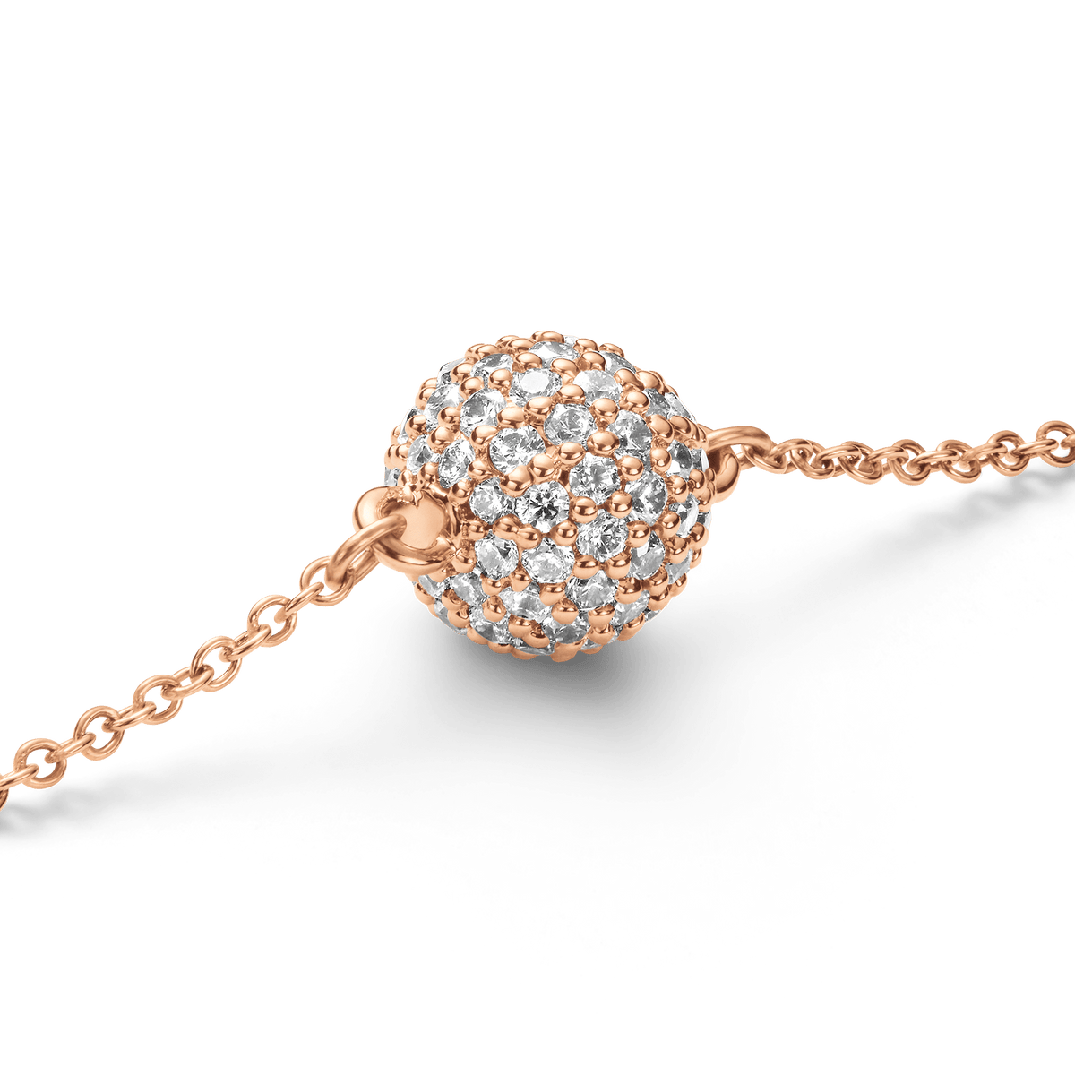 Close-up of the Pavé Crystal Pendant Bracelet Rose Gold, highlighting the spherical pavé ball pendant set with sparkling cubic zirconia crystals on a fine rose gold chain.