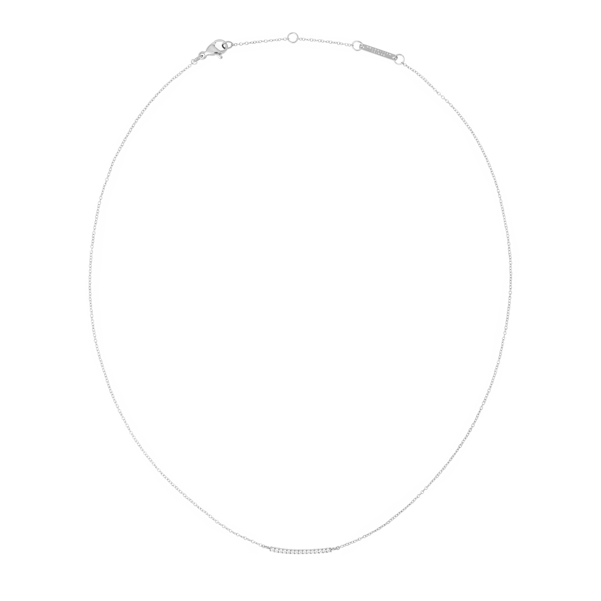 Slender silver necklace with a minimalist chain and a delicate bar pendant set with sparkling white cubic zirconia, featuring an adjustable clasp for versatile styling.