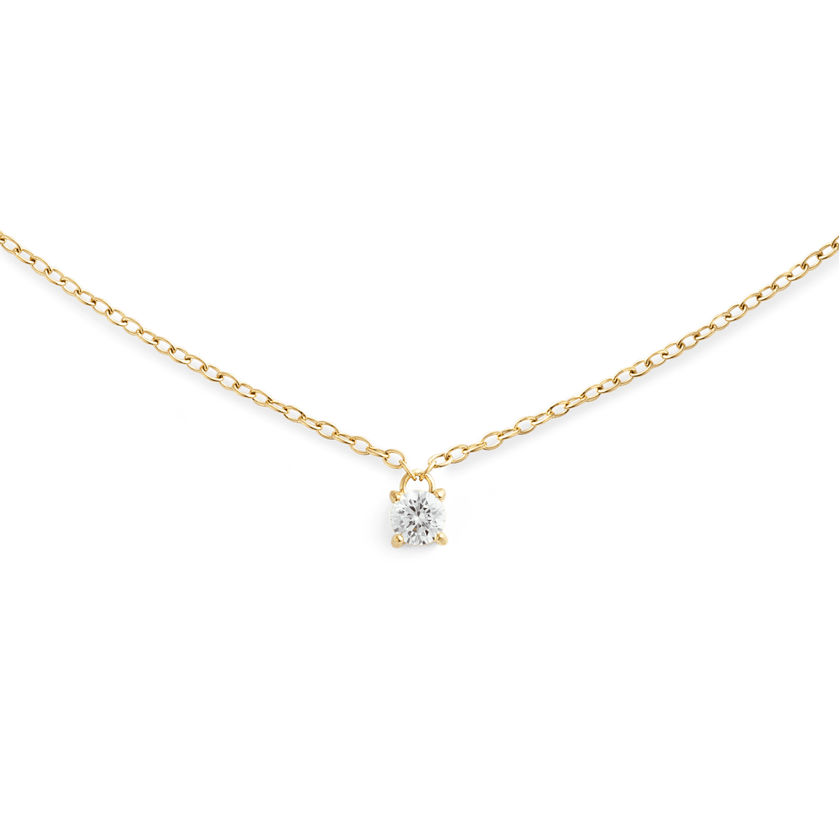 A delicate gold necklace featuring a fine chain and a single petite white cubic zirconia solitaire pendant, designed for a minimalist and elegant look.