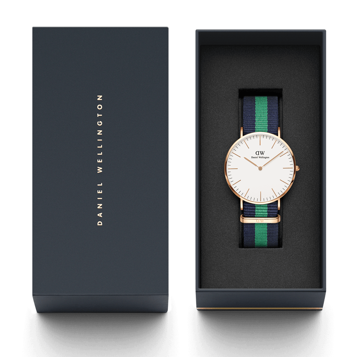 Classic Warwick Rose Gold watch with a navy and green NATO strap, presented in a Daniel Wellington gift box, highlighting its elegant packaging and suitability for gifting.