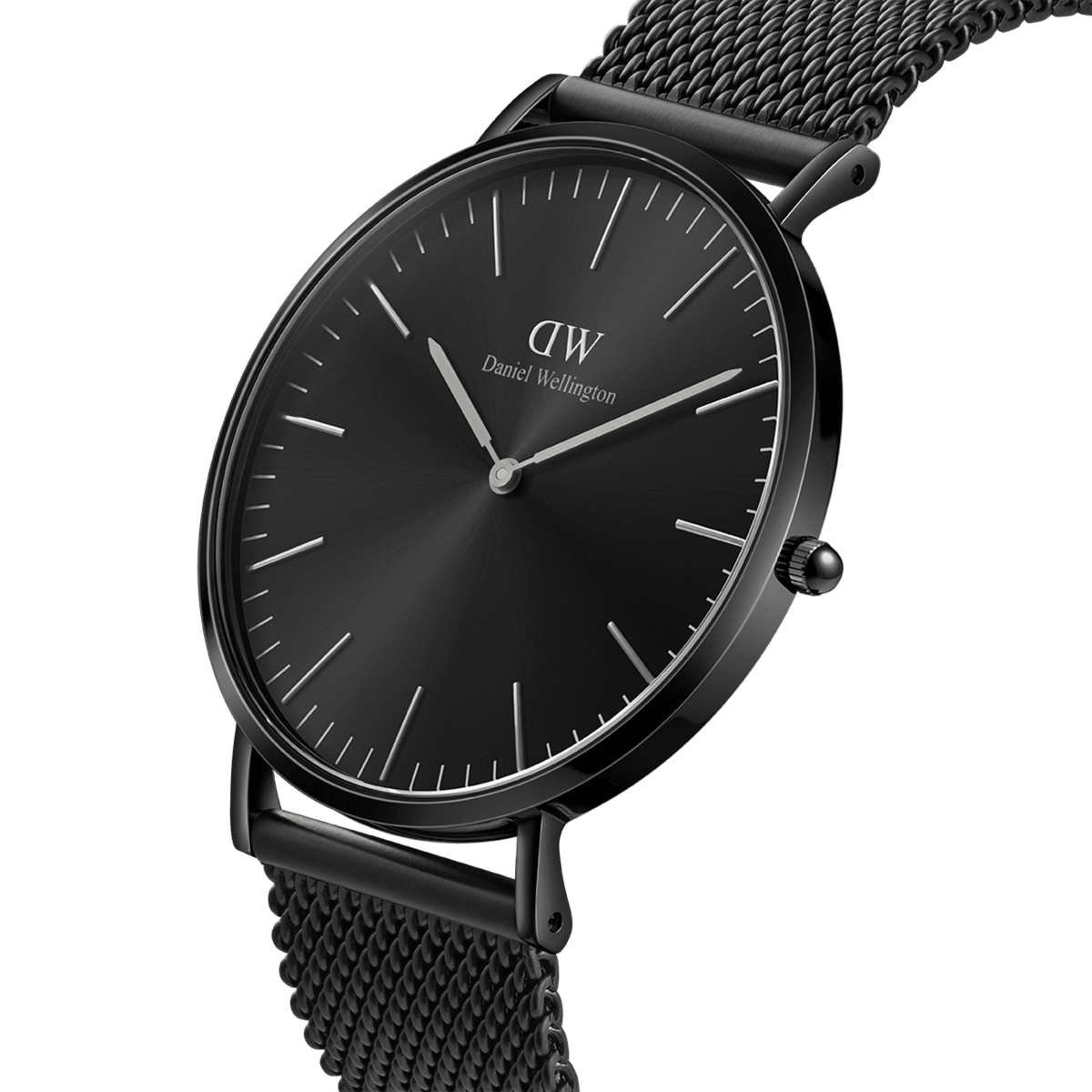 Classic Mesh Onyx Black watch with a 40mm black stainless steel case, minimalist black sunray dial, and a woven mesh bracelet, shown from a side angle to highlight its slim profile and modern monochrome design.