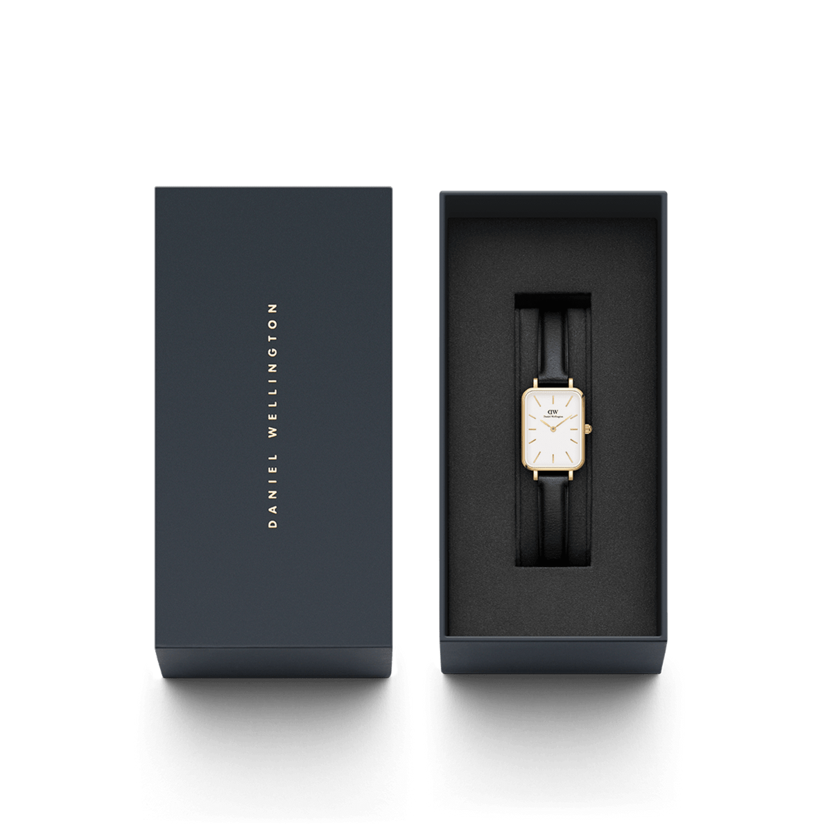 Quadro Pressed Sheffield Gold ladies watch with a rectangular gold case and black leather strap, elegantly presented in a branded Daniel Wellington gift box.