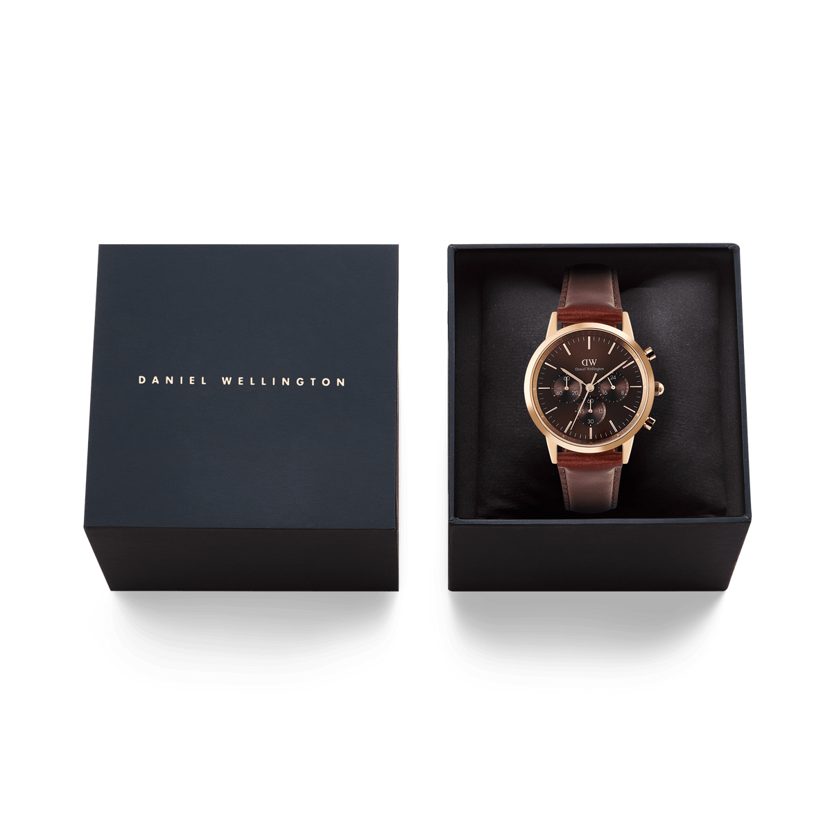 Iconic Chronograph St Mawes Amber RG men's watch presented in a premium Daniel Wellington gift box, featuring a rose gold case, amber dial, and brown leather strap.