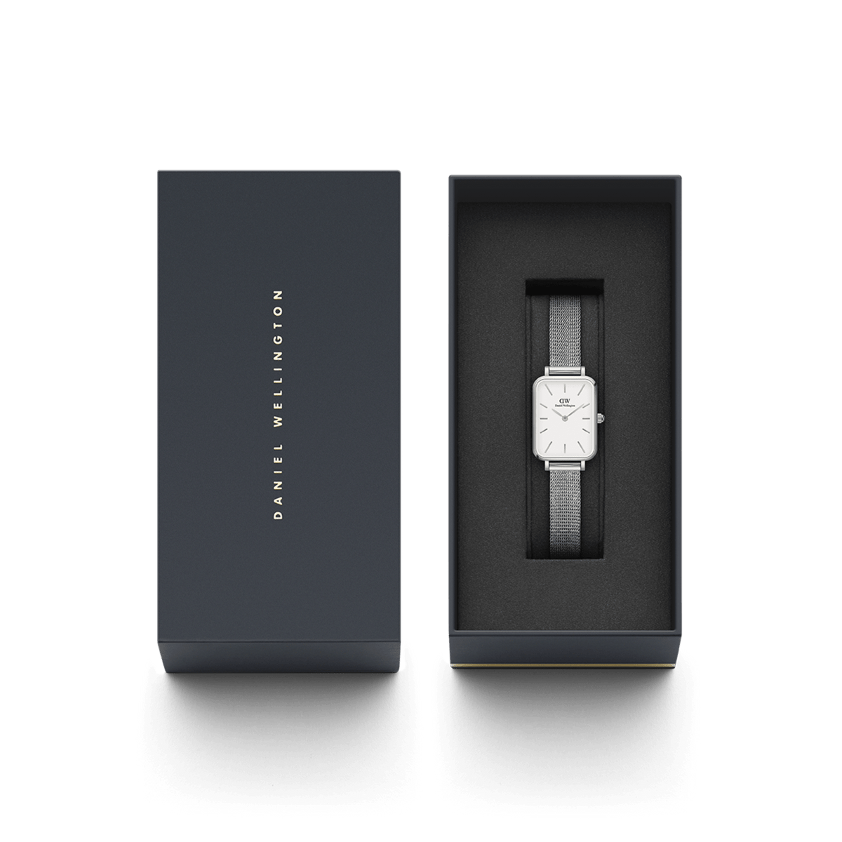 Quadro Pressed Sterling presented in its branded gift box, featuring a minimalist rectangular silver watch with a mesh strap, ideal for gifting or adding to a personal collection.