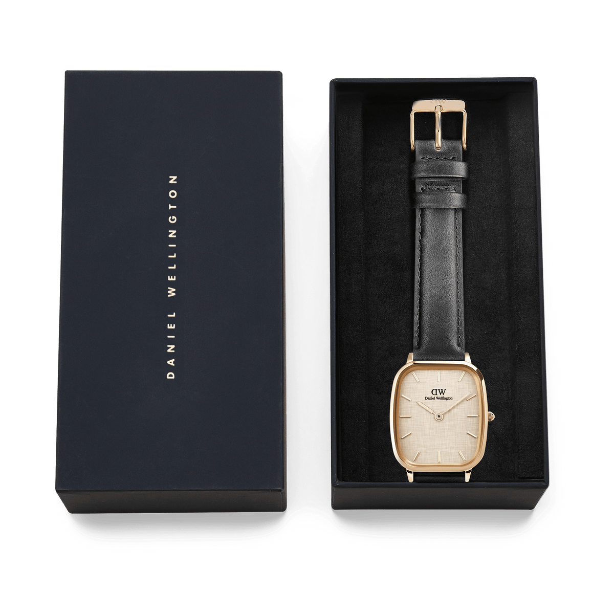 Marlon Sheffield Linen Gold men's watch presented in a Daniel Wellington gift box, featuring a cushion-shaped gold case, linen-textured dial, and classic black leather strap, ideal for gifting or adding to a collection.