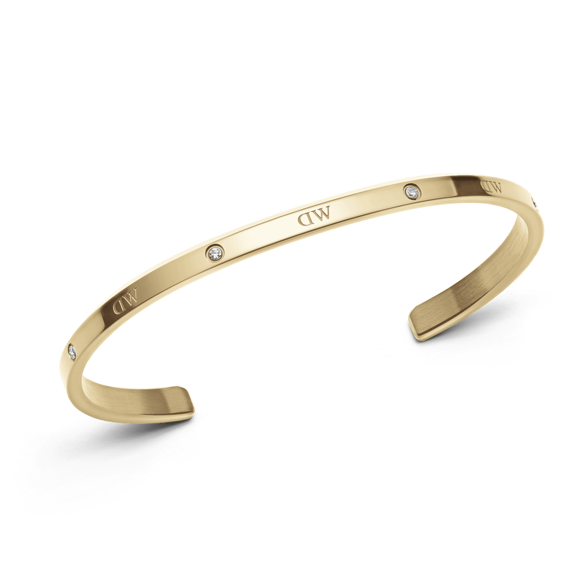Classic Lumine Bracelet G featuring a slim, polished gold cuff with six sparkling crystals and an open design, crafted for comfortable everyday wear and elegant styling.