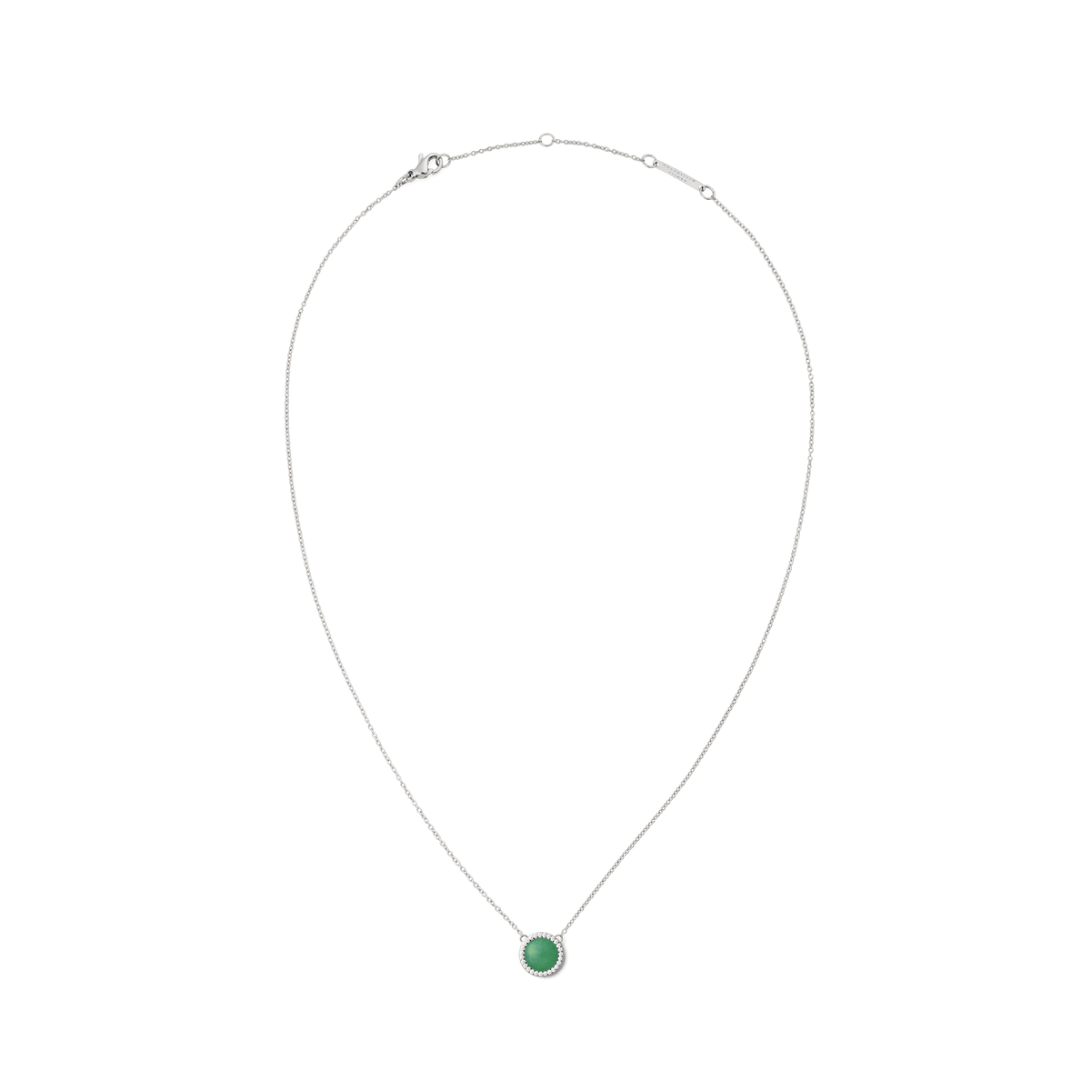 Silver necklace with a fine chain featuring a round green jade pendant framed by white cubic zirconia crystals, offering a minimalist and elegant look.