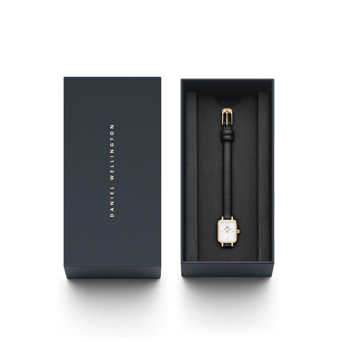 Quadro Mini Sheffield Gold ladies watch with a rectangular gold-tone case and black leather strap, presented in a sleek Daniel Wellington branded gift box.