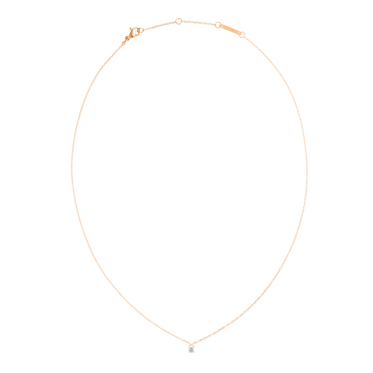 Mirelle Solitaire Necklace Rose Gold shown laid flat, featuring a slim adjustable rose gold chain with a single white cubic zirconia pendant at the centre.
