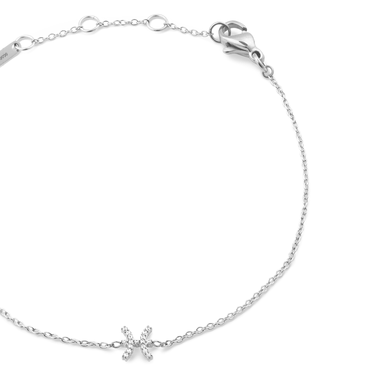 Crystal Zodiac Chain Bracelet Silver featuring a fine stainless steel chain, adjustable sizing rings, and a Pisces zodiac charm set with sparkling crystals.