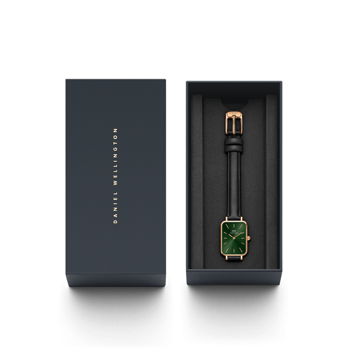 Quadro Pressed Sheffield Emerald Rose Gold watch presented in a sleek Daniel Wellington gift box, featuring a rectangular rose gold case, emerald green dial, and black leather strap, ideal for gifting or adding to your collection.