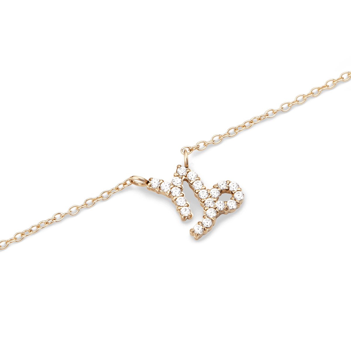 Close-up of the Crystal Zodiac Chain Necklace Gold featuring a Capricorn pendant set with sparkling crystals on a fine gold chain, highlighting its elegant and modern design.