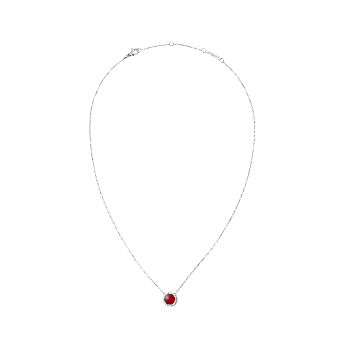 A fine silver chain necklace featuring a domed red agate pendant surrounded by white cubic zirconia crystals, designed for a refined and modern look.