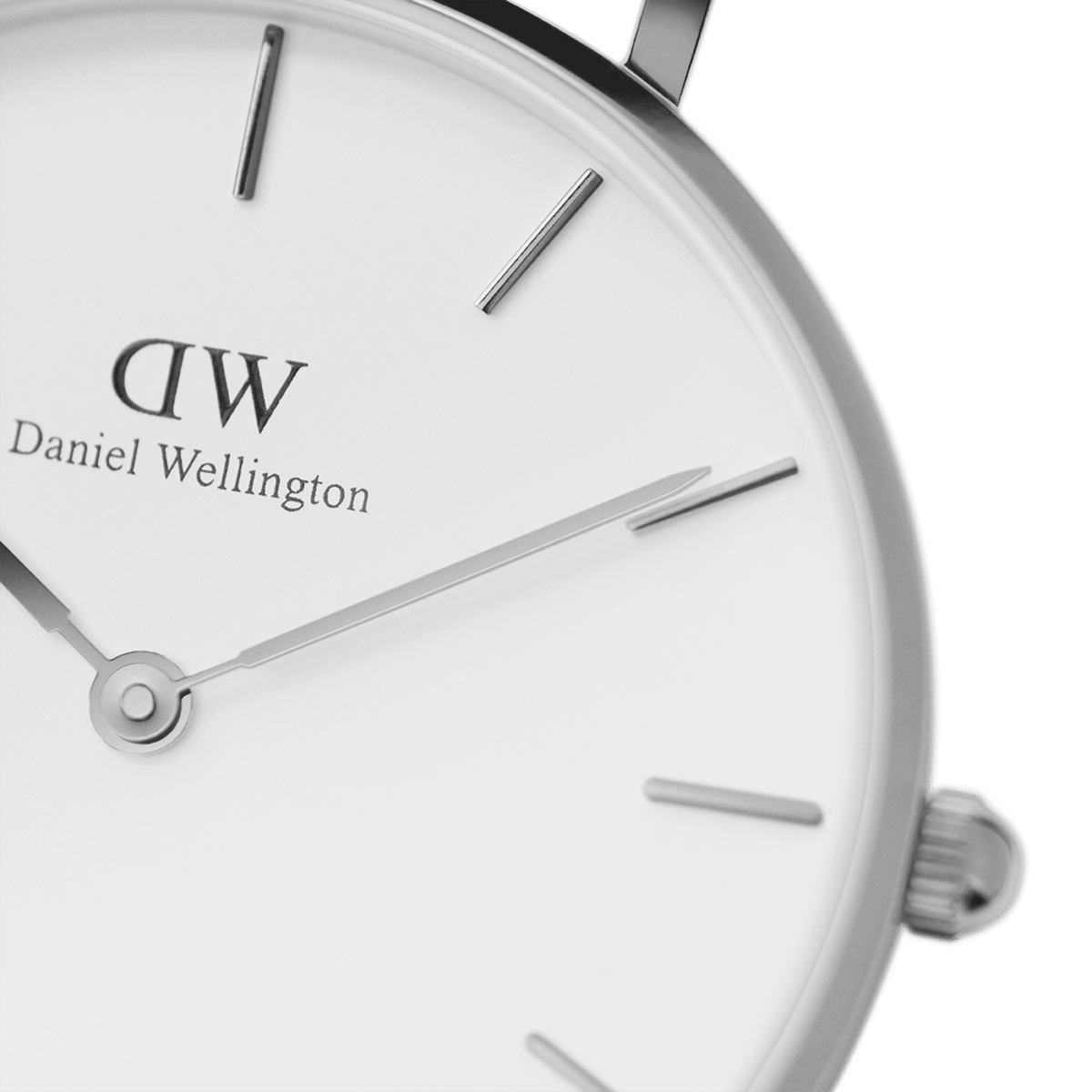 Detailed view of the Petite Sterling Silver watch face, highlighting the minimalist white dial, slim silver hands, and polished stainless steel case.