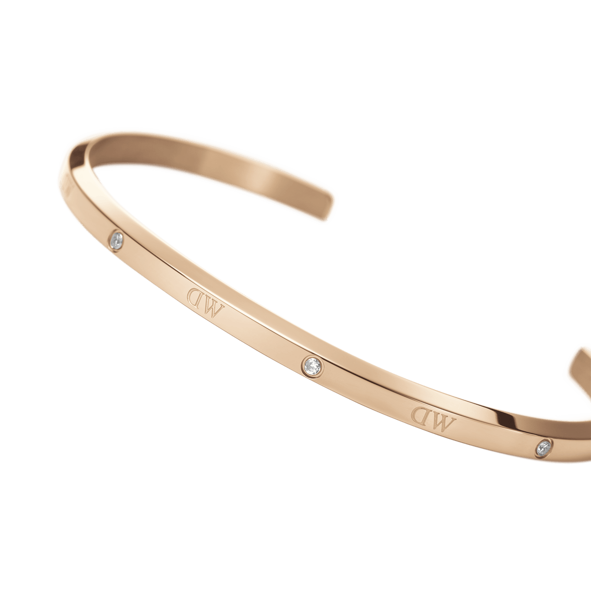Rose gold Classic Lumine Bracelet RG with a slim, open cuff design and six sparkling crystals, ideal for layering with other jewellery or wearing as a standalone accessory.