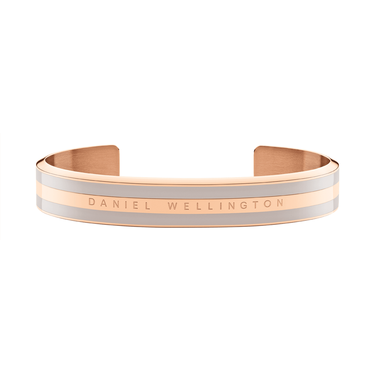 Emalie Bracelet Desert Sand Rose Gold displays a wide, double-plated stainless steel cuff with rose gold and desert sand enamel, finished with Daniel Wellington branding for a sophisticated, modern look.