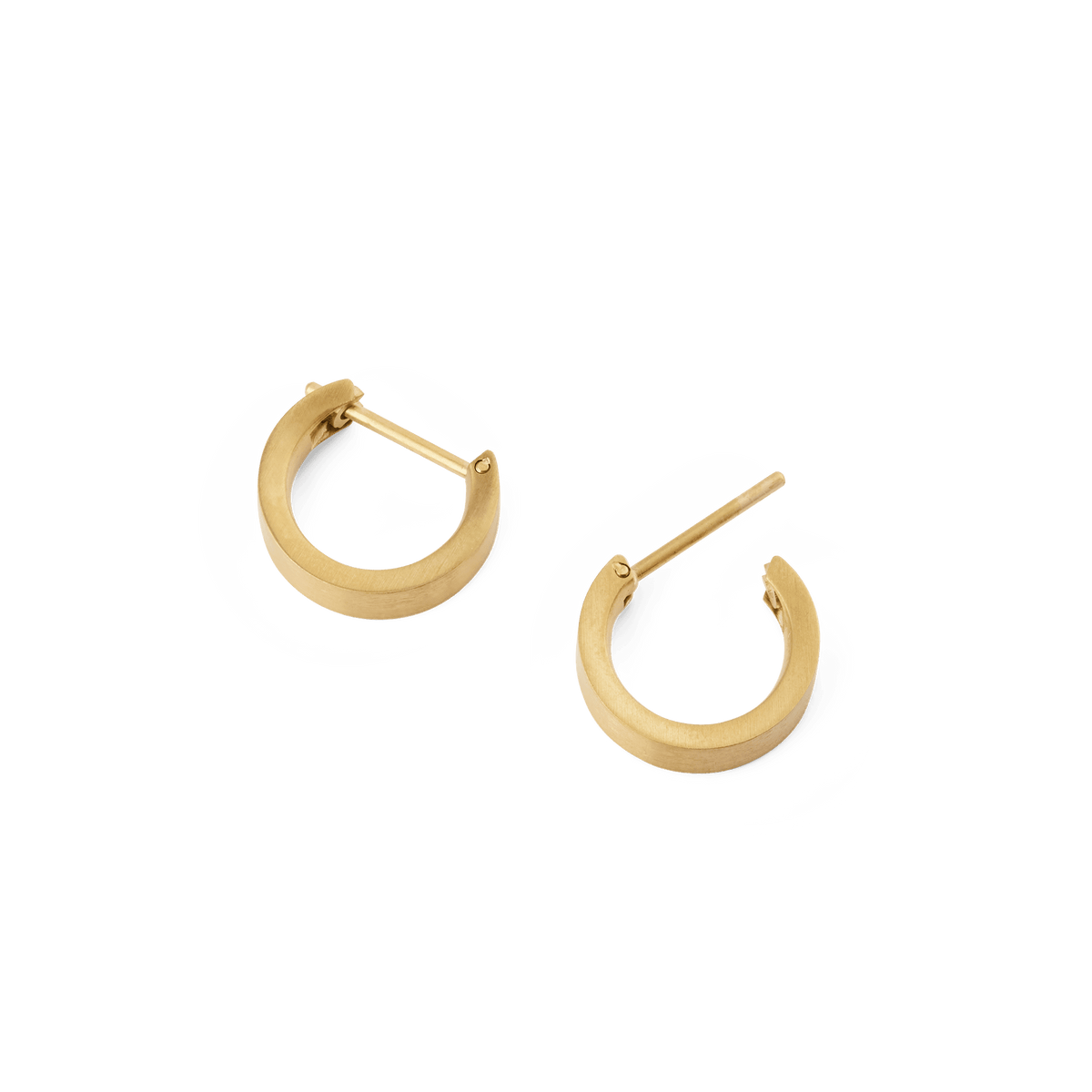 A pair of Line Earrings Brushed Gold 3.5mm shown open, highlighting their compact hoop design, softly brushed gold finish, and secure latch-back posts.
