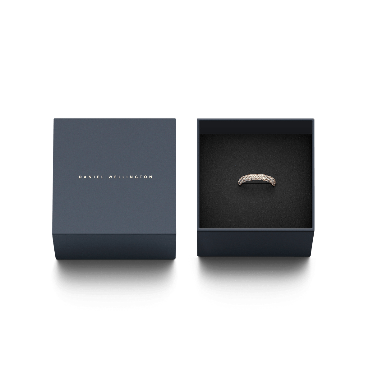 Pavé Crystal Ring Rose Gold presented in a sleek Daniel Wellington gift box, highlighting the ring’s sparkling cubic zirconia crystals and elegant rose gold band, ideal for gifting or special occasions.