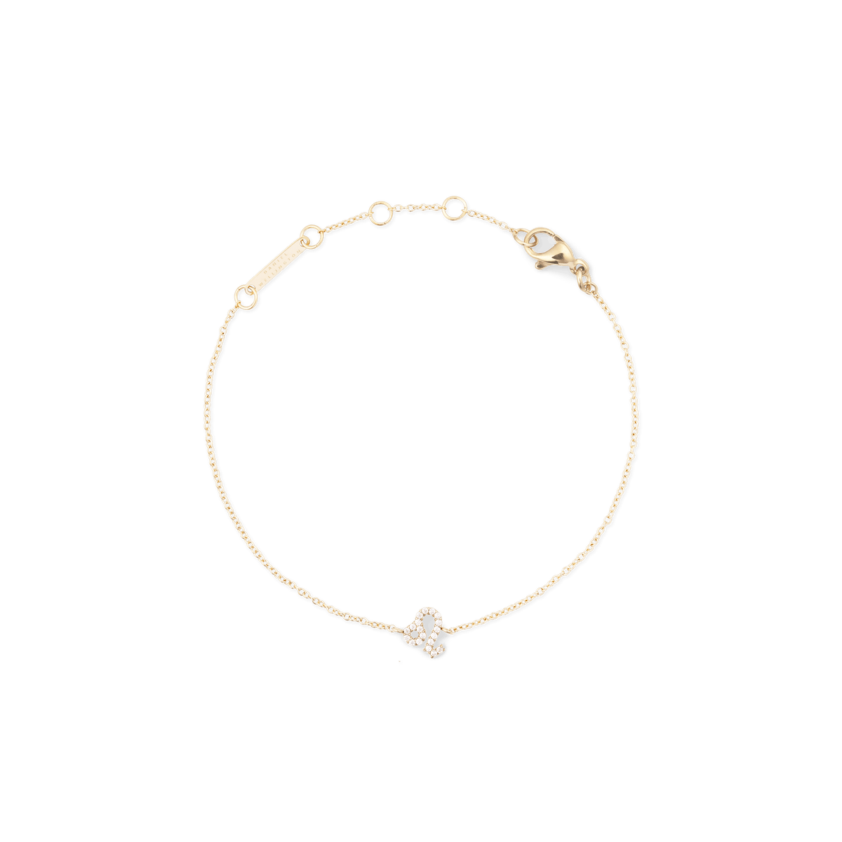 Slim gold chain bracelet with an adjustable clasp, featuring a Leo zodiac charm set with sparkling crystals for a subtle, personalised touch.